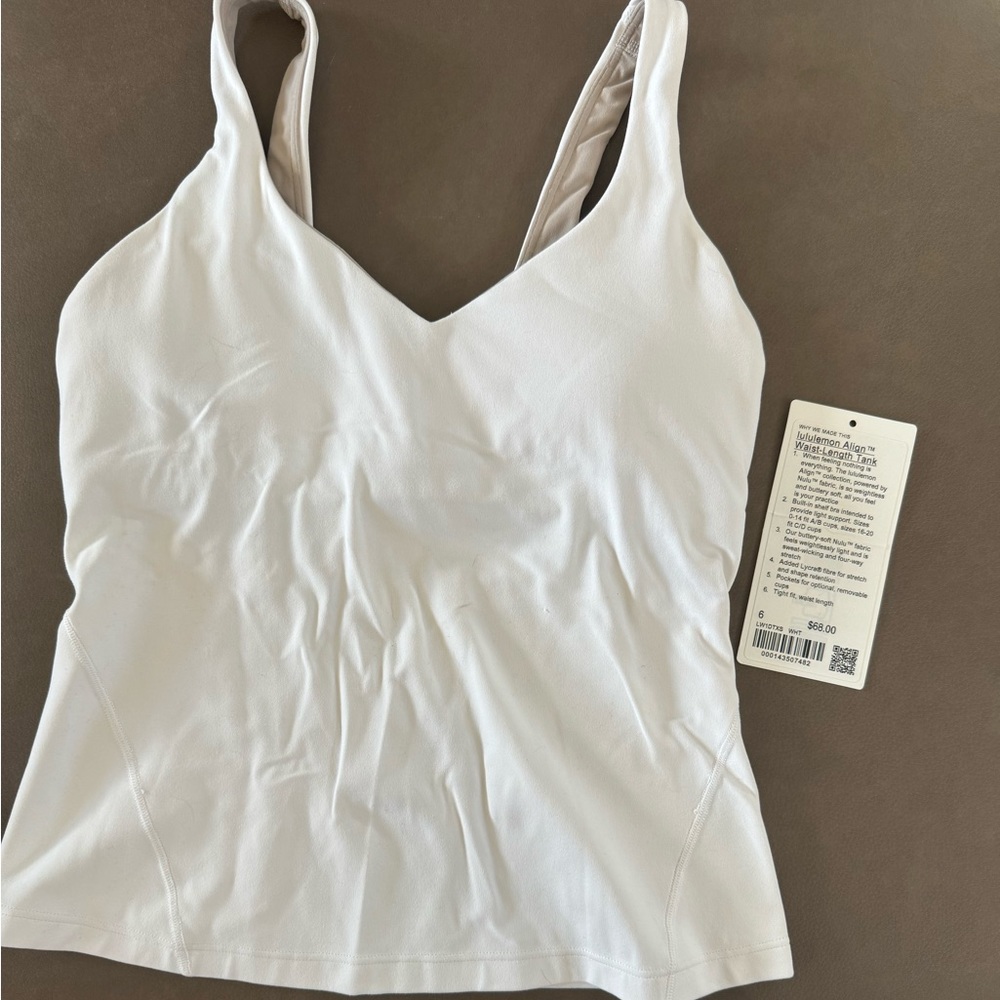 Lululemon Align Waist-Length Tank. Size 6. White. Very good pre-owned condition.